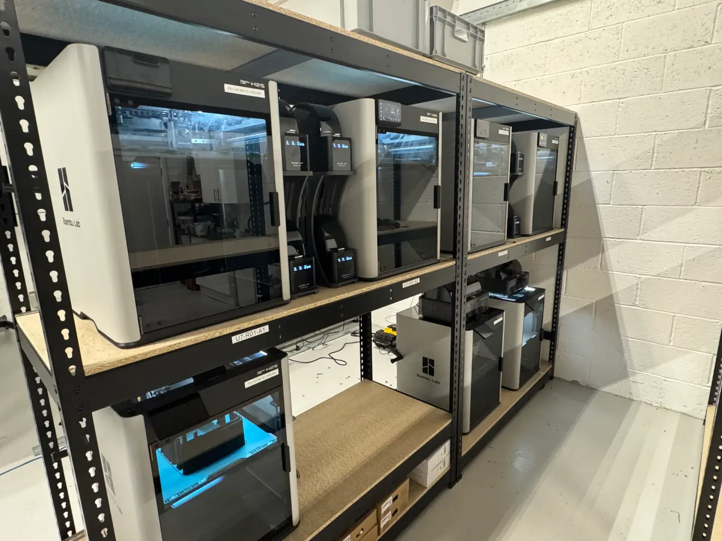 3D printers producing Graphite Modular storage components in a print farm